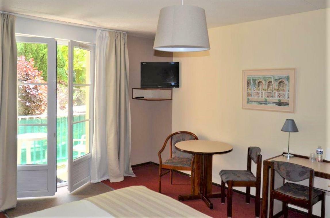 Hotel Et Studios D'Orfeuil Бурбонн-ле-Бен Экстерьер фото